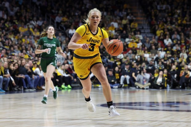 Sydney Affolter (3), a Marist graduate, dribbles the ball up the court against Cleveland State during a game at Wells Fargo Arena in Des Moines, Iowa, on Saturday, Dec. 16, 2023. (Jerod Ringwald / Iowa athletics photo)