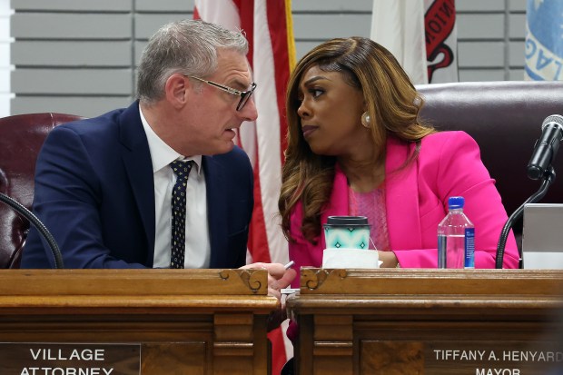 Village attorney Michael T. Del Galdo and Dolton Mayor Tiffany Henyard speak during a Village Board meeting March 4, 2024. (Terrence Antonio James/Chicago Tribune)