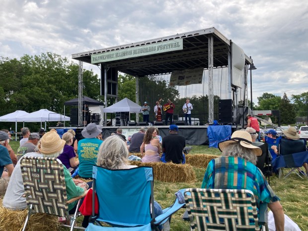 Special Consensus, introduced at one of their performances as "the festival's house band," performs Sunday, July 14, on the Prairie Park Stage at the 2024 Frankfort Bluegrass Festival. The band is led by banjo player Greg Cahill, of Oak Lawn. (Paul Eisenberg/Daily Southtown)