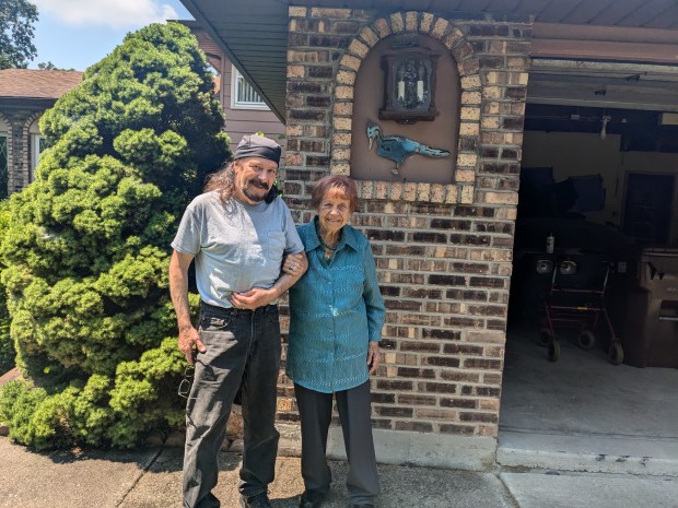 Ann and Denny Lazarowicz stand outside her Oak Forest home after celebrating her 100th birthday last week at a restaurant. (Janice Neumann/Daily Southtown)