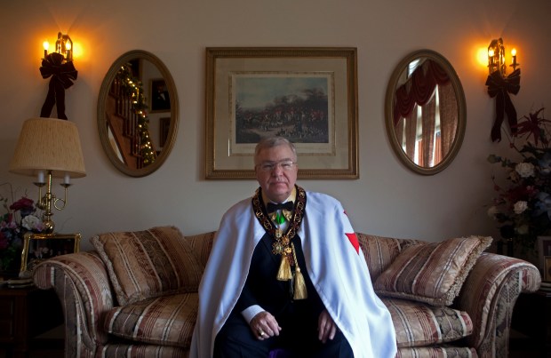 Patrick Rea, a retired brigadier general, dressed as grand commander of the International Knights Templar Dec. 14, 2009, in his Tinley Park home. (David Pierini/Chicago Tribune).