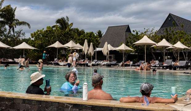 Families on vacation make new friends in the pool near the Toba Bar & Grill, Intercontinental Hotel & Resort, Fiji. (Steve Haggerty/TNS)