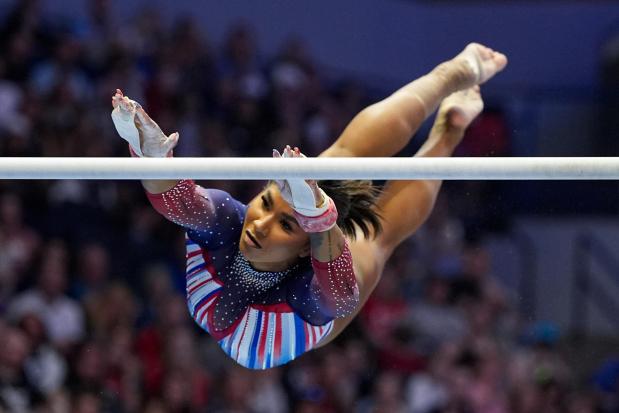 Jordan Chiles competes on the uneven bars at the United States Gymnastics Olympic Trials on June 30, 2024, in Minneapolis. (AP Photo/Abbie Parr)