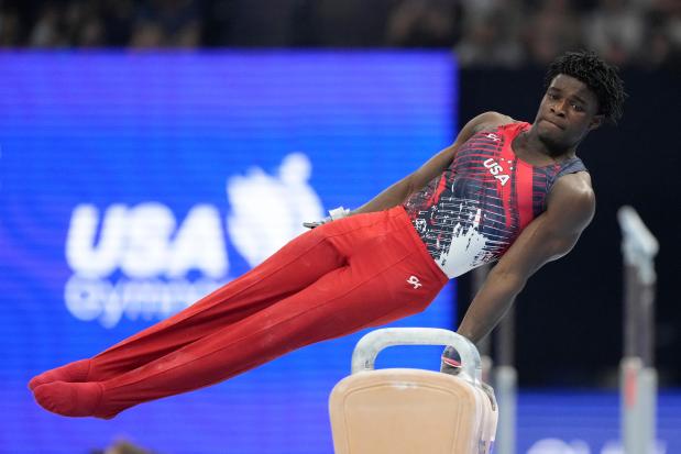 Frederick Richard competes on the pommel horse at the United States Gymnastics Olympic Trials on Saturday, June 29, 2024, in Minneapolis. (AP Photo/Charlie Riedel)