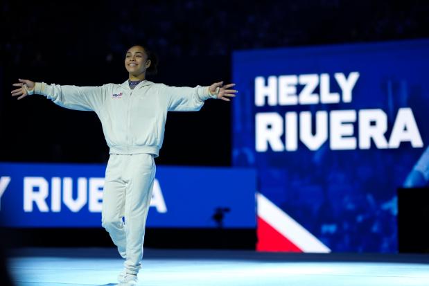 Hezly Rivera is introduced at the U.S. gymnastics Olympic Trials on June 28, 2024 in Minneapolis. (AP Photo/Charlie Riedel)