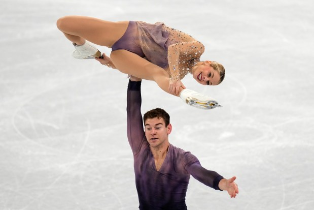 Alexa Knierim and Brandon Frazier, of the United States, compete in the pairs free skate program during the figure skating competition at the 2022 Winter Olympics, Feb. 19, 2022, in Beijing. (Bernat Armangue/AP)