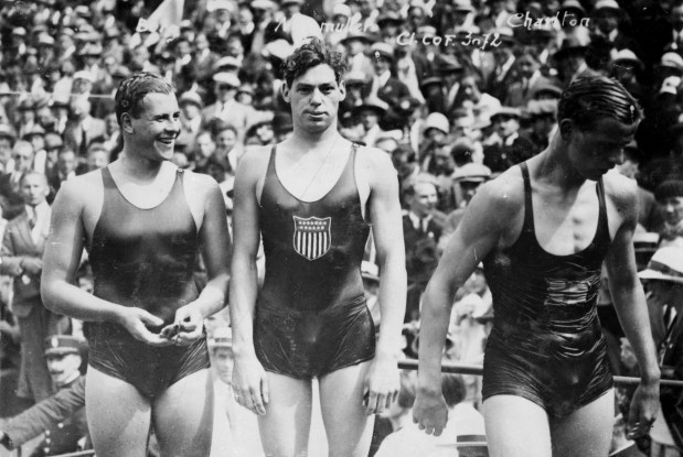 The 400-meter freestyle swimming podium at 1924 Summer Olympic Games in France with winner Johnny Weissmuller, center. (Archives CNOSF/Getty-AFP)