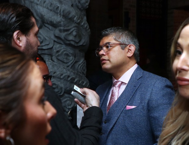 Aaron Del Mar, center, a Republican candidate for lieutenant governor of Illinois, greets supporters at an event at the nightclub Tao Chicago, on North Dearborn Street on April 27, 2022, in Chicago. (Terrence Antonio James/Chicago Tribune)