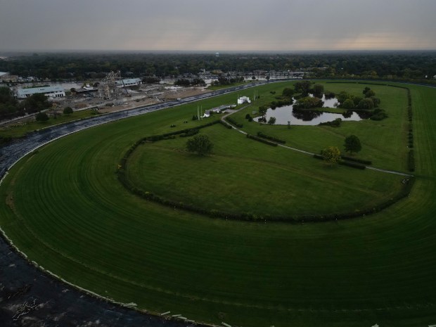 Crews demolish the grandstand at the former Arlington International Racecourse on Sept. 25, 2023, in Arlington Heights. (Stacey Wescott/Chicago Tribune)