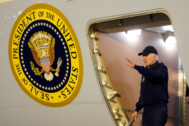 President Joe Biden walks down the steps of Air Force One at Dover Air Force Base in Delaware on July 17, 2024. President Joe Biden dropped out of the 2024 race for the White House on Sunday, July 21, ending his bid for reelection following a disastrous debate with Donald Trump that raised doubts about his fitness for office just four months before the election. (Susan Walsh/AP)