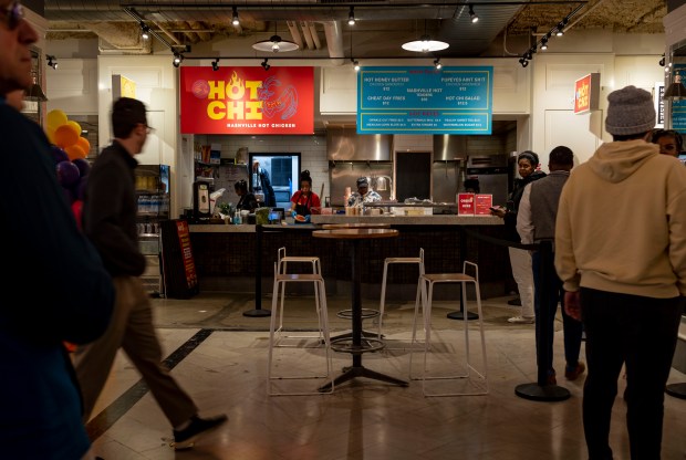 Customers line up for lunch at Hot Chi on May 25, 2023, in Revival Food Hall. (Brian Cassella/Chicago Tribune)