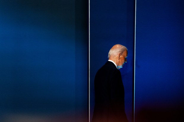 President Joe Biden exits the stage after speaking at NATO's 75th anniversary summit in Washington earlier this month. (Demetrius Freeman/The Washington Post)