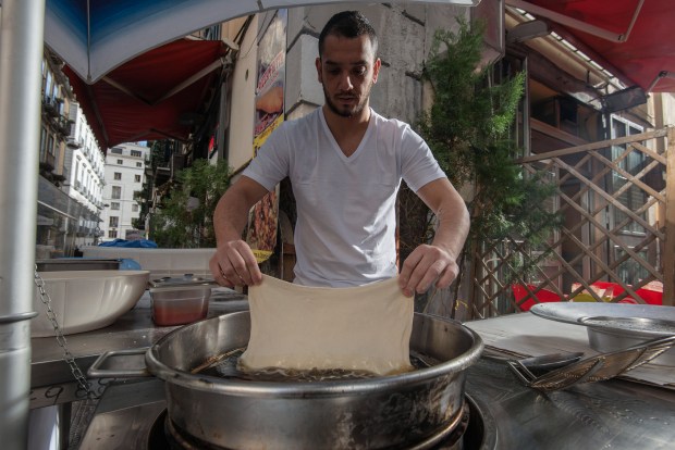 Fried pizza is made on the street in Naples, Italy. (Salvatore Laporta/Getty)