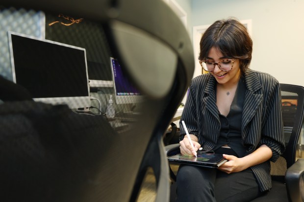 Nitya Mehrotra sketches on her iPad during her lunch break on June 25, 2024, in Chicago. The sketch is being used in one of her animations.    (Stacey Wescott/Chicago Tribune)