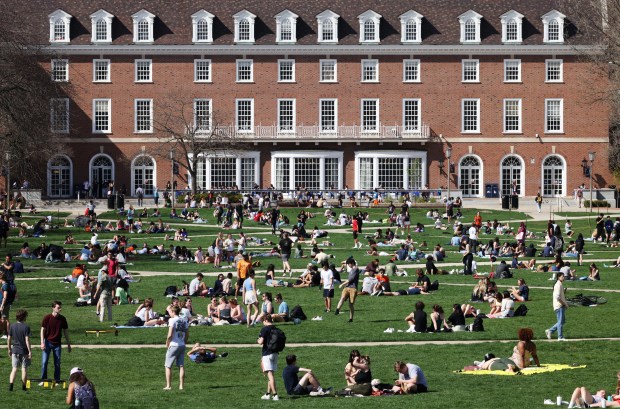 Students enjoy the University of Illinois Urbana-Champaign Quad on April 11, 2023. (John J. Kim/Chicago Tribune)