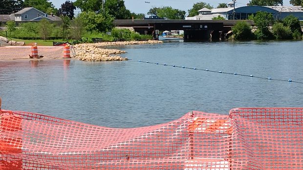 The Route 12 Bridge low-side opening, affectionately known as "Beer Can Bridge," is scheduled to be a subject of debate at the July 24 Fox Waterway Agency meeting. The village has requested a no-wake zone running parallel with the beach.(Gregory Harutunian/For the Lake County News-Sun)