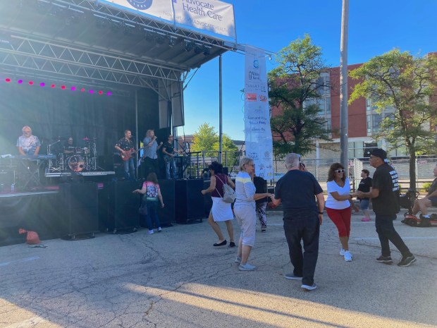 Fest-goers take to the dance floor at Taste of Park Ridge on July 18, 2024. (Pam DeFiglio, Chicago Tribune/Pioneer Press)