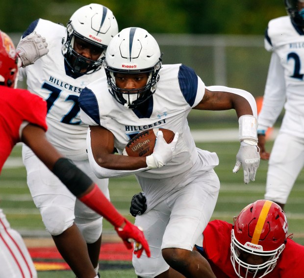 Hillcrest's Erimus Wright looks for daylight against Tinley Park during a South Suburban Red game in Tinley Park on Friday, Sept. 8, 2023.