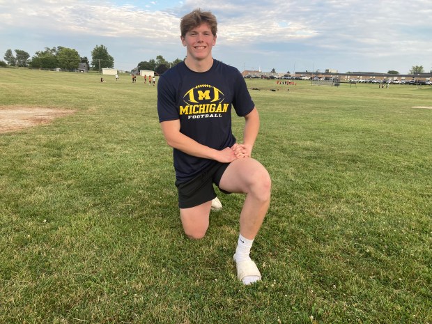 Peter Popp, sidelined by a hamstring injury most of last season before returning for Sandwich's playoff run to the Class 4A quarterfinals, gets ready for the first practice on Monday, Aug. 12, 2024. (Rick Armstrong / The Beacon-News)