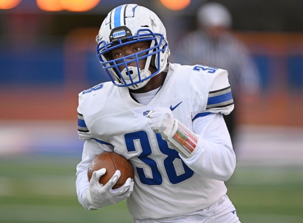 St. Charles North's Joell Holloman (38) during the fourth quarter of Saturday's IHSA Class 7A playoff game at Hoffman Estates, Nov. 5, 2022. St. Charles North won the game, 25-9. (Brian O'Mahoney for the The Beacon-News)