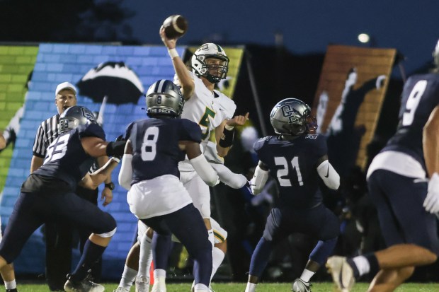 Waubonsie Valley's Josh Siekierski (5) makes a throw during a game against Oswego East in Oswego on Friday Aug. 30, 2024. (Troy Stolt / The Beacon News)