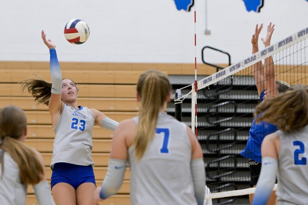 St. Charles North's Haley Burgdorf (23) returns the ball against Rosary during a match in St. Charles on Monday, Aug. 26, 2024. (Mark Black / for the Beacon-News)