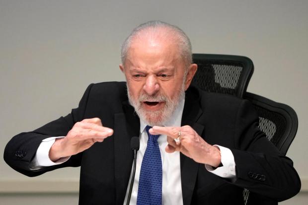 Brazilian President Luiz Inacio Lula da Silva attends the opening session of the forum titled A Project for Brazil, focused on energy transition and South American integration, at the National Confederation of Industry headquarters in Brasilia, Brazil, Wednesday, Aug. 14, 2024. (AP Photo/Eraldo Peres)