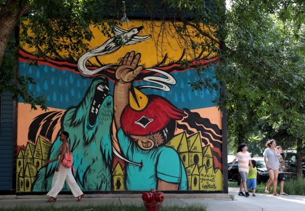 A Sentrock/Yollocalli mural collaboration along 19th Street in Chicago's Pilsen neighborhood in 2018. (Antonio Perez/ Chicago Tribune)