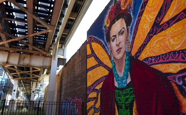 A mural of Frida Kahlo under the CTA "L" tracks along 18th Street in Pilsen in 2020. A number of different tours take in the artwork in the mural-rich Chicago neighborhood. (Brian Cassella/Chicago Tribune)