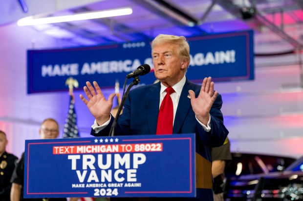 Donald Trump responds to a question from a reporter after his remarks on Aug. 20, 2024 at the Livingston County Sheriff's Office in Howell, Michigan. (Photo by Nic Antaya/Getty Images)