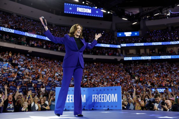 Democratic presidential candidate, U.S. Vice President Kamala Harris holds her hands up after walking onstage at a campaign rally at the Fiserv Forum on Aug. 20, 2024 in Milwaukee, Wisconsin. Later this week Harris will accept her party's presidential nomination at the Democratic National Convention in Chicago, Illinois. (Photo by Anna Moneymaker/Getty Images)