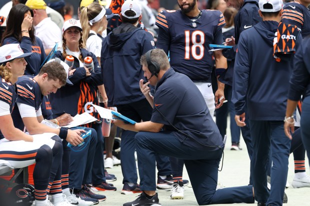 Bears offensive coordinator Shane Waldron talks with players on the sideline in the first quarter of a preseason game against the Bengals at Soldier Field on Aug. 17, 2024. (John J. Kim/Chicago Tribune)