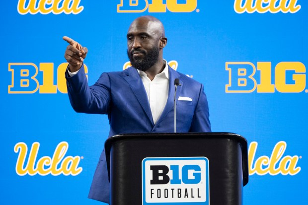 UCLA coach DeShaun Foster talks at Big Ten media days at Lucas Oil Stadium on July 24, 2024, in Indianapolis. (AP Photo/Doug McSchooler)