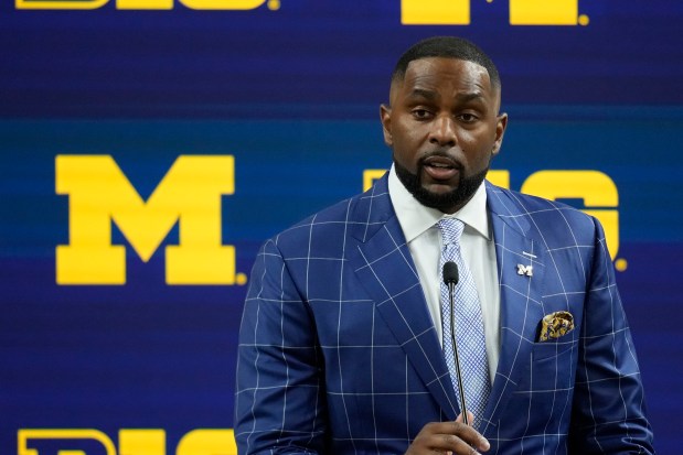 Michigan coach Sherrone Moore speaks at the Big Ten media days at Lucas Oil Stadium on July 25, 2024, in Indianapolis. (AP Photo/Darron Cummings)