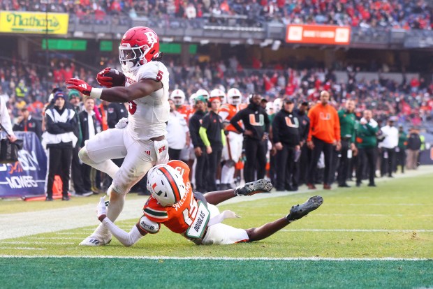 Rutgers' Kyle Monangai rushes for a touchdown against Miami during the Pinstripe Bowl at Yankee Stadium on Dec. 28, 2023, in New York. (Mike Stobe/Getty Images)