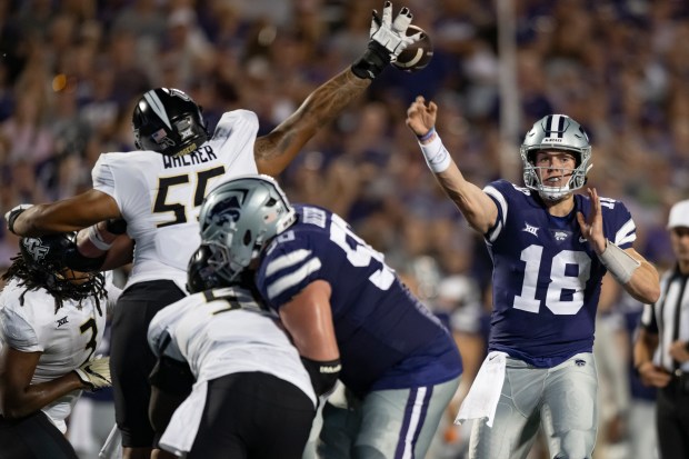 UCF defensive tackle John Walker (55) swats a pass from Kansas State quarterback Will Howard on Sept. 23, 2023, at Bill Snyder Family Stadium in Manhattan, Kan. (Jesse Bruner/Special to the Orlando Sentinel)