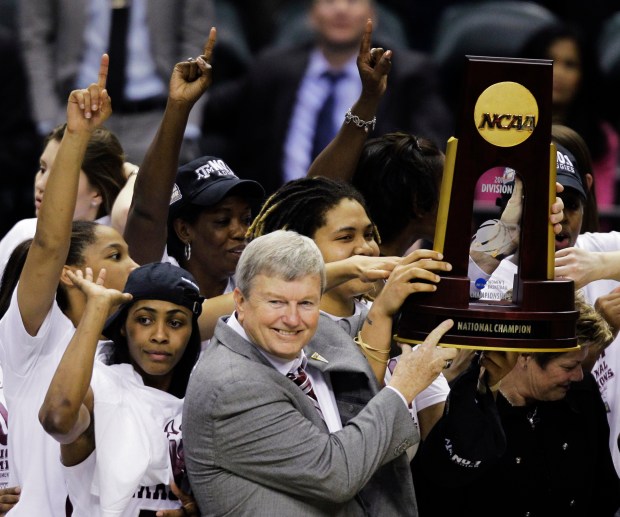 Texas A&M coach Gary Blair and players celebrate with the trophy after their 76-70 win over Notre Dame in the NCAA Tournament championship game on April 5, 2011. (AP Photo/Amy Sancetta)