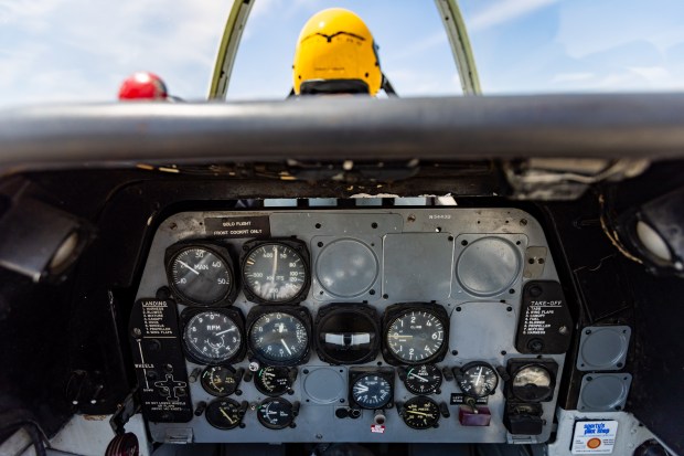 Cockpit controls are visible before a Trojan Phlyers Flight Demonstration Team flight in a North American T-28 Trojan above Gary, Indiana on Aug. 8, 2024. (Tess Crowley/Chicago Tribune)