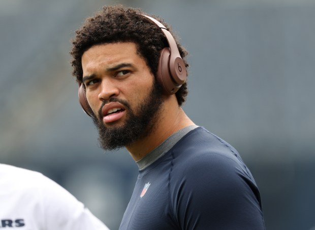 Bears quarterback Caleb Williams warms up for a preseason game against the Bengals at Soldier Field on Aug. 17, 2024, in Chicago. (John J. Kim/Chicago Tribune)