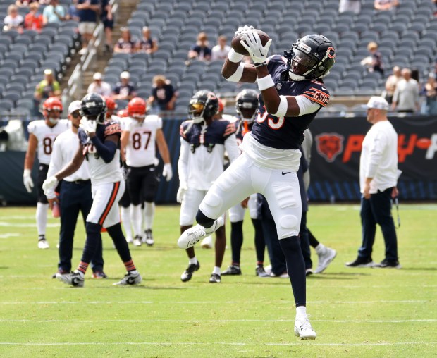 Bears running back Ian Wheeler (33) warms up before a preseason game against the Bengals at Soldier Field on Aug. 17, 2024, in Chicago. (John J. Kim/Chicago Tribune)