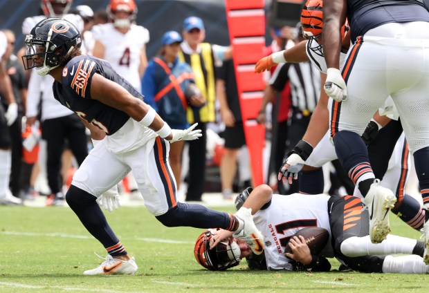 Bears cornerback Kyler Gordon (6) gestures after sacking Bengals quarterback Logan Woodside (11) in the first quarter of a preseason game at Soldier Field on Aug. 17, 2024, in Chicago. (John J. Kim/Chicago Tribune)