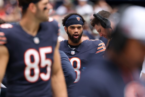 Bears quarterback Caleb Williams (18) walks the sideline in the first quarter against the Bengals in a preseason game at Soldier Field on Aug. 17, 2024, in Chicago. (John J. Kim/Chicago Tribune)