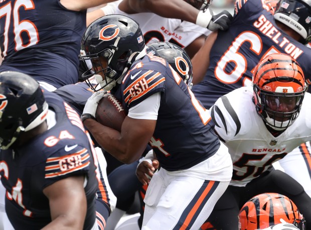 Bears running back Khalil Herbert carries the ball against the Bengals in a preseason game at Soldier Field on Aug. 17, 2024. (John J. Kim/Chicago Tribune)