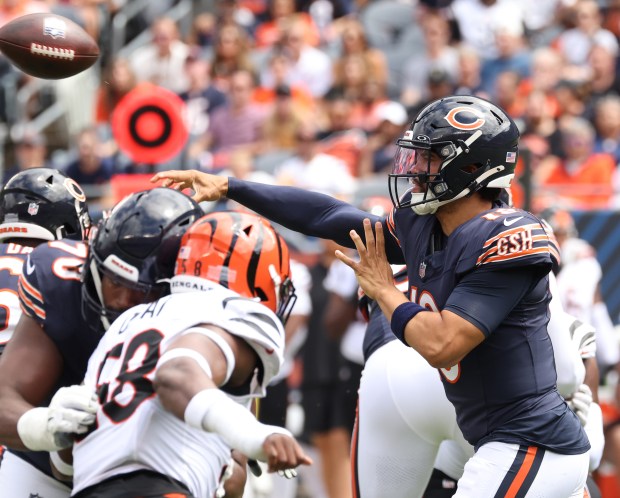 Bears quarterback Caleb Williams (18) throws in the first quarter against the Bengals in a preseason game at Soldier Field on Aug. 17, 2024, in Chicago. (John J. Kim/Chicago Tribune)