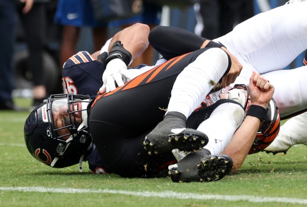 Bears defensive end Daniel Hardy (92) sacks Bengals quarterback Logan Woodside (11) in the third quarter of a preseason game at Soldier Field on Aug. 17, 2024, in Chicago. (John J. Kim/Chicago Tribune)