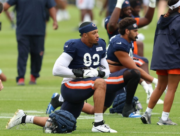 Bears defensive end Daniel Hardy stretches out during practice at Halas Hall on Aug. 15, 2024, in Lake Forest. (Stacey Wescott/Chicago Tribune)