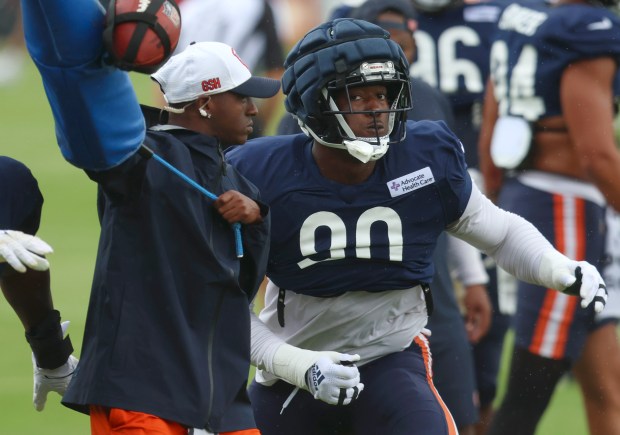 Bears defensive end Dominique Robinson runs through defensive drills during a joint practice at Halas Hall with the Bengals on Aug. 15, 2024, in Lake Forest. (Stacey Wescott/Chicago Tribune)