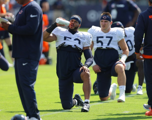 Chicago Bears linebacker T.J. Edwards (53) drinks water during training camp at Halas Hall on Aug. 7, 2024, in Lake Forest. (Stacey Wescott/Chicago Tribune)