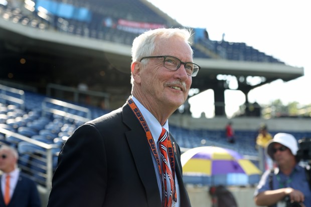 Bears chairman George McCaskey walks onto the field before the Hall of Fame Game against the Texans at Tom Benson Hall of Fame Stadium on Aug. 1, 2024, in Canton. (John J. Kim/Chicago Tribune)