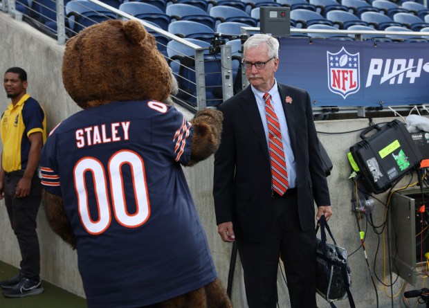 Bears Chairman George McCaskey is greeted by team mascot Staley before the Hall of Fame Game against the Texans at Tom Benson Hall of Fame Stadium on Aug. 1, 2024, in Canton, Ohio. (John J. Kim/Chicago Tribune)